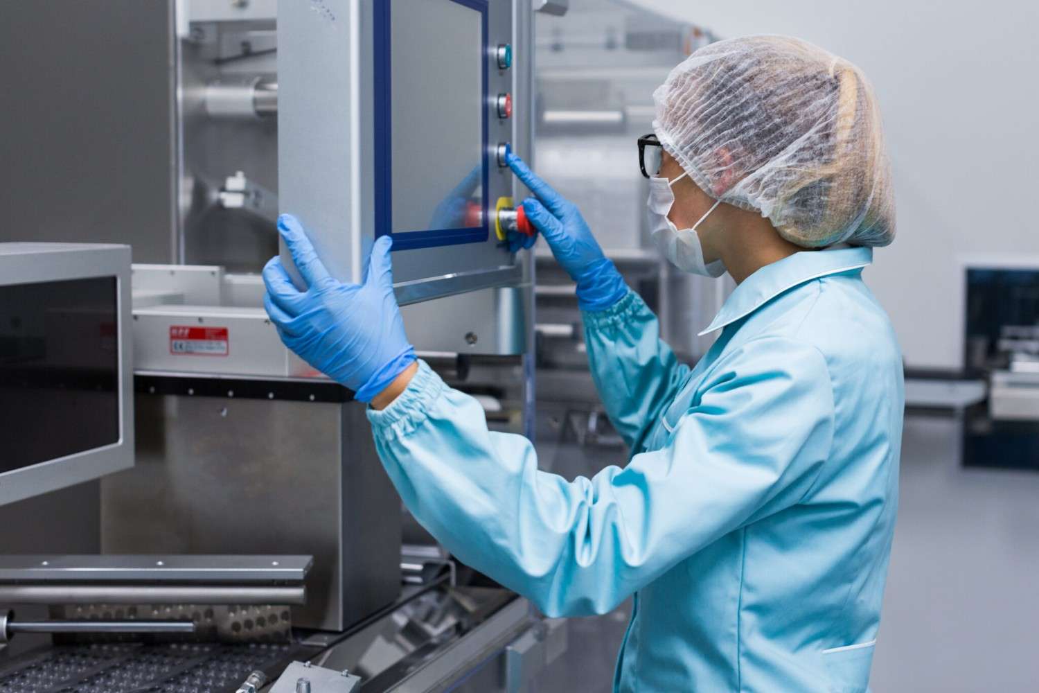 Sterile Processing Technician student training in instrument sterilization and cleanroom procedures